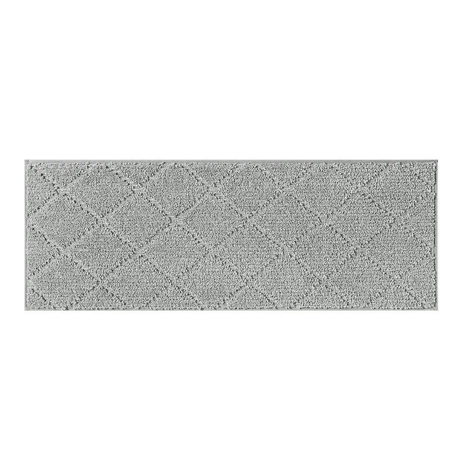 Rectangular grey stair mat with a textured surface on a white background