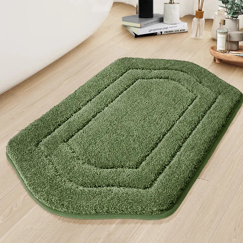 Green Oval Fluffy Bath Rug in front of Hot Tub
