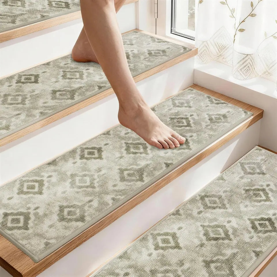 Person stepping onto a patterned rug on a staircase