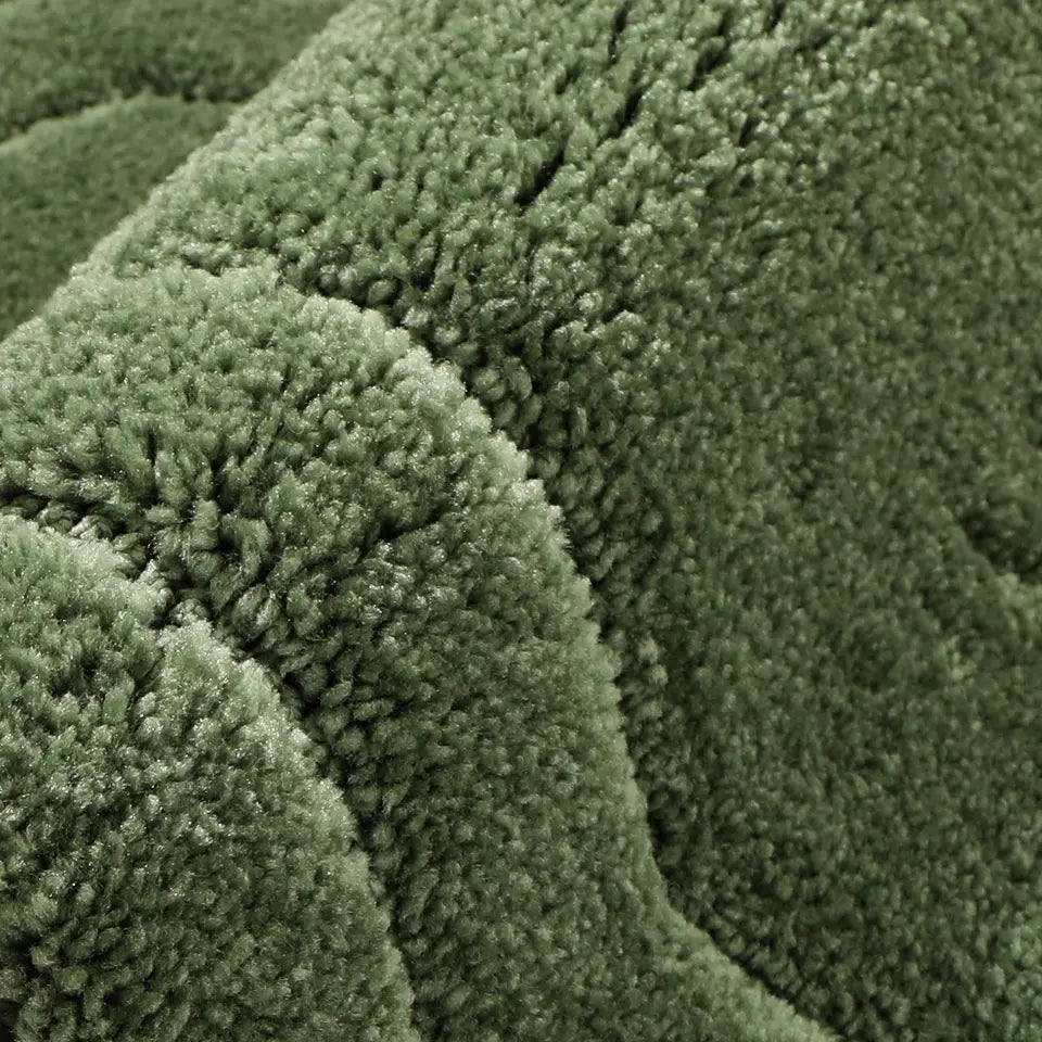 Texture Detail of Green Oval Fluffy Bath Rug