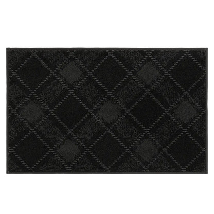 20x32 black doormat with a diamond pattern on a white background