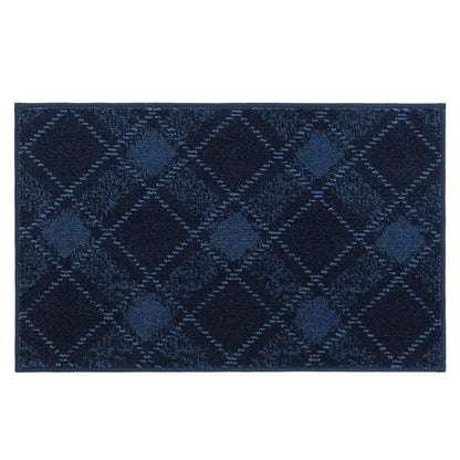 20x32 navy blue doormat with diamond pattern on a white background