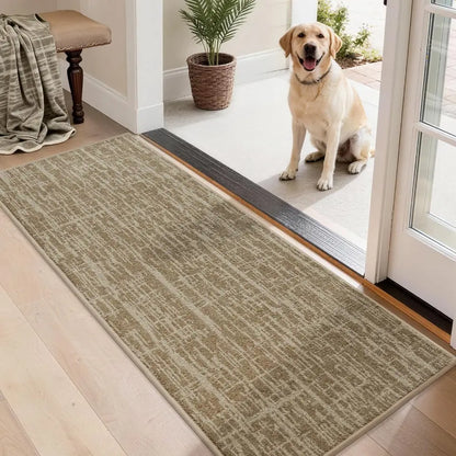 Dog standing on a beige doormat at the entrance of a home