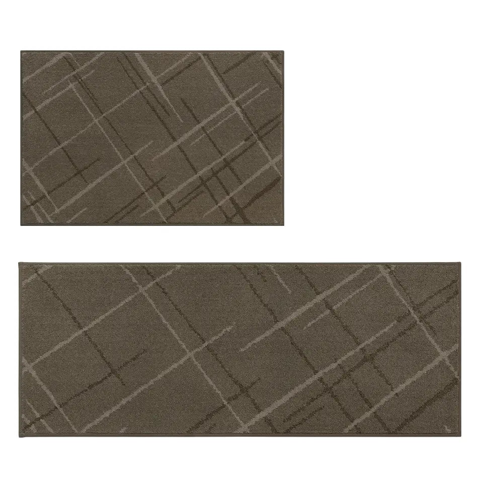 Two brown textured abstract kitchen rug with geometric pattern on a white background