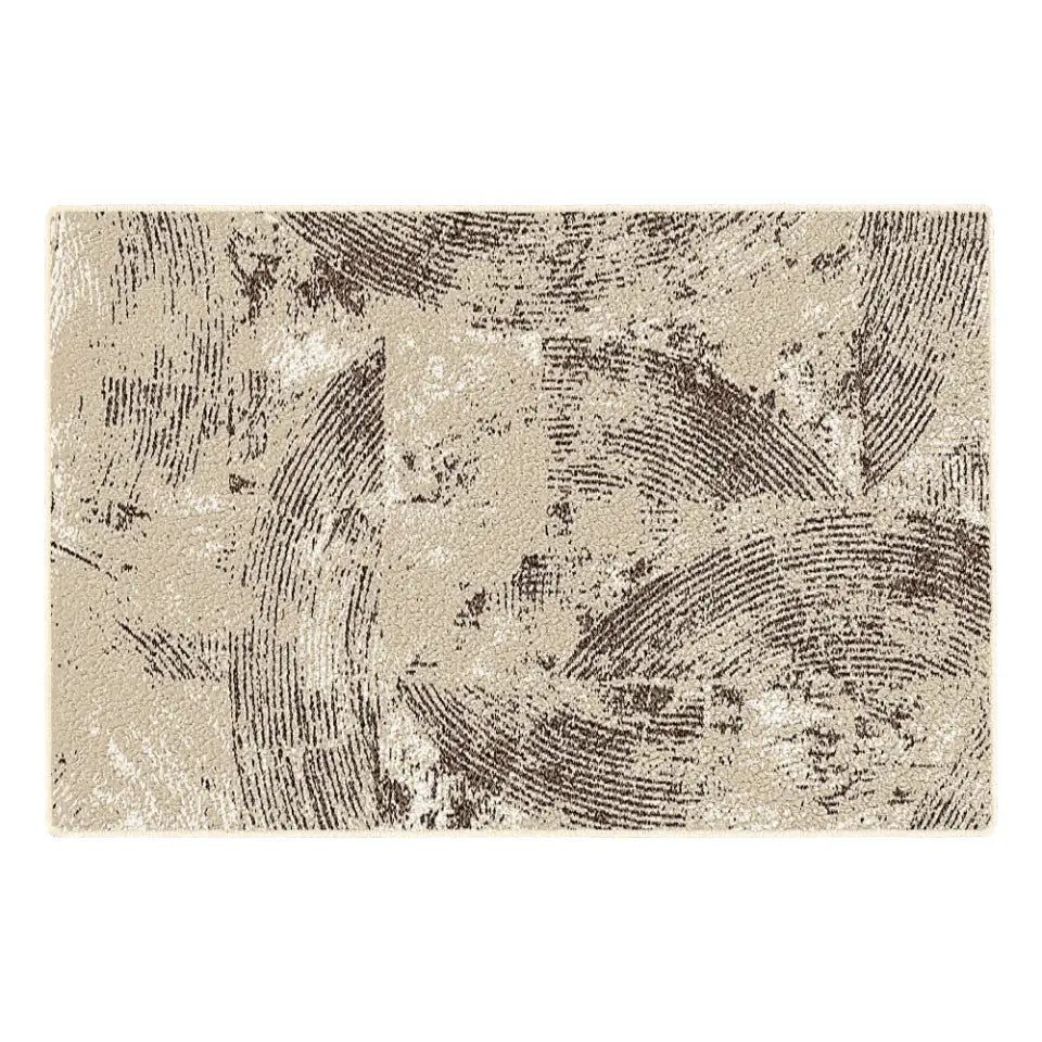 Textured area rug with abstract pattern on a white background