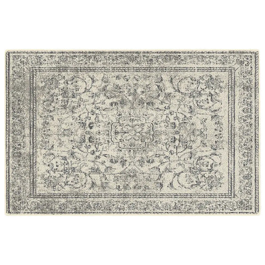 Decorative rug with intricate pattern on a white background