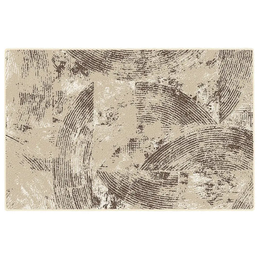Textured area rug with circular patterns on a plain background