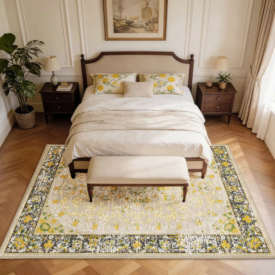 Bedroom with best gold & charcoal floral rug, bed, and nightstands.