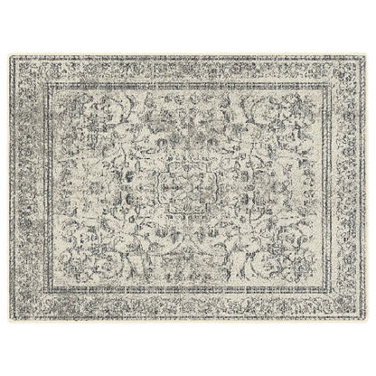 Decorative rug with intricate pattern on a plain white background
