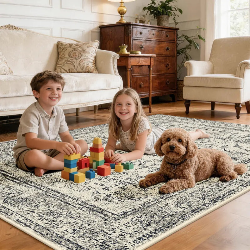 Two children playing with building blocks on a faded grey & cream rug in a living room with a dog.