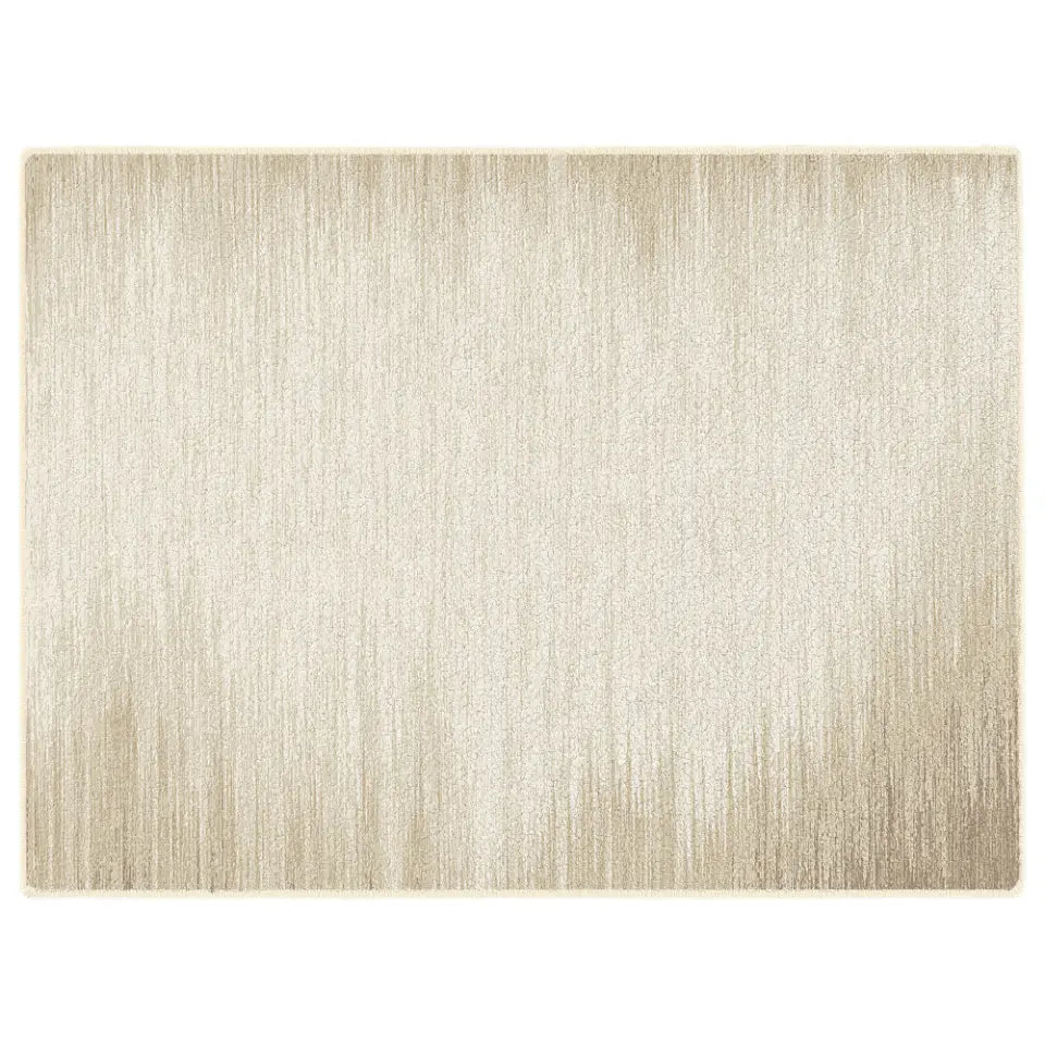 Beige area rug with a subtle pattern on a white background
