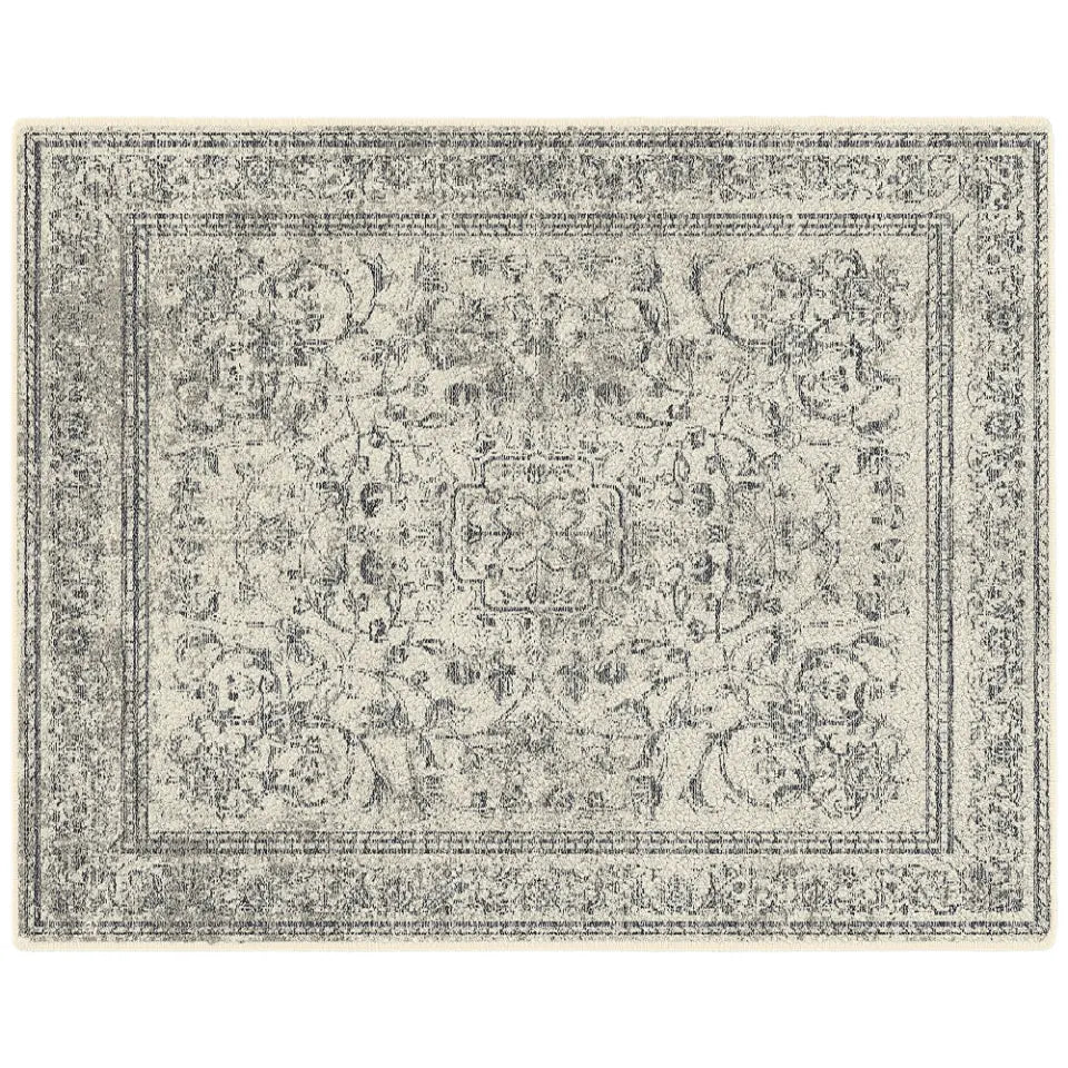 Decorative rug with intricate pattern on a white background