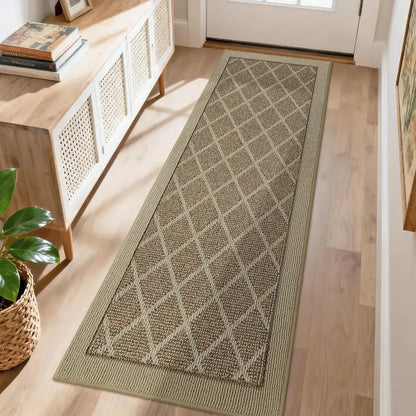 Beige patterned rug on a wooden floor in a room with a wooden cabinet and plant.