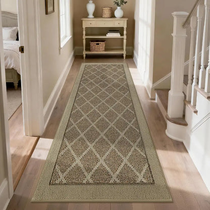 Beige long rectangular rug with diamond pattern on a wooden floor in a home setting.