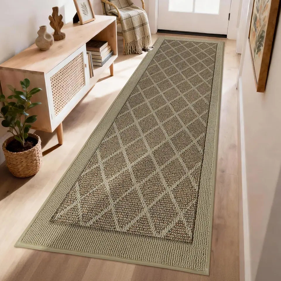 Beige patterned rug on a wooden floor in a room with furniture and decor.