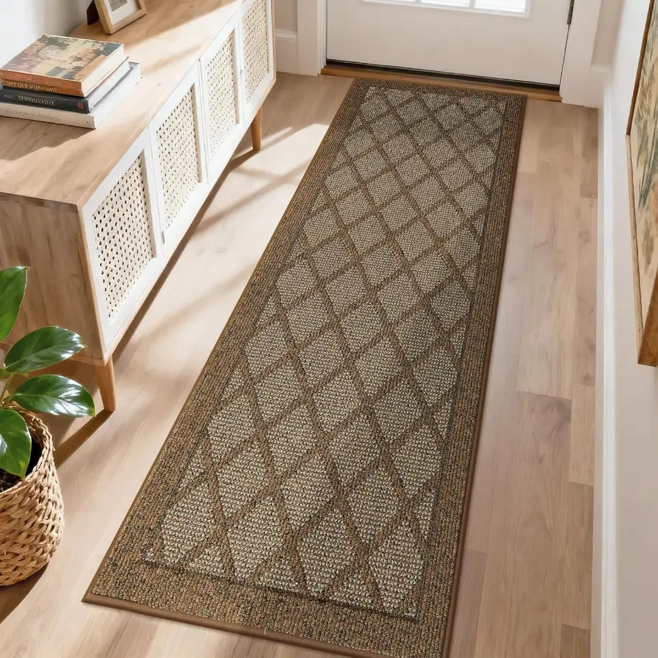 Patterned light brown runner rug on a wooden floor in a home setting