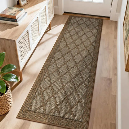 Patterned light brown runner rug on a wooden floor in a home setting