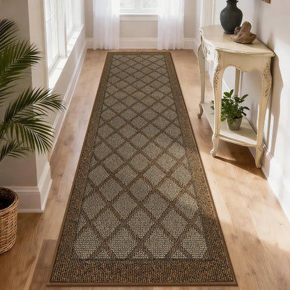 Long light brown diamond-patterned rug on a wooden floor with a side table and plants in the background.