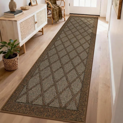 Long light brown runner rug on a wooden floor in a room with a sideboard and plant.