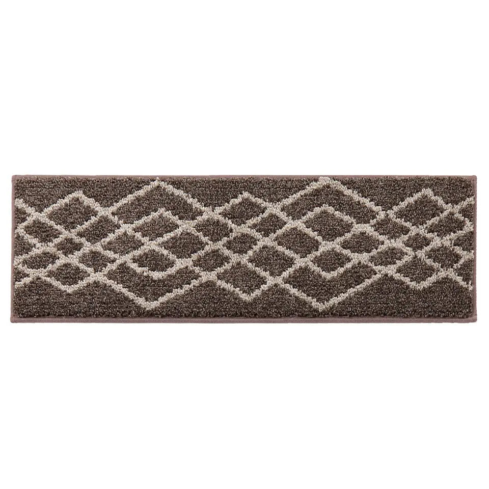 Brown and beige patterned rug on a white background
