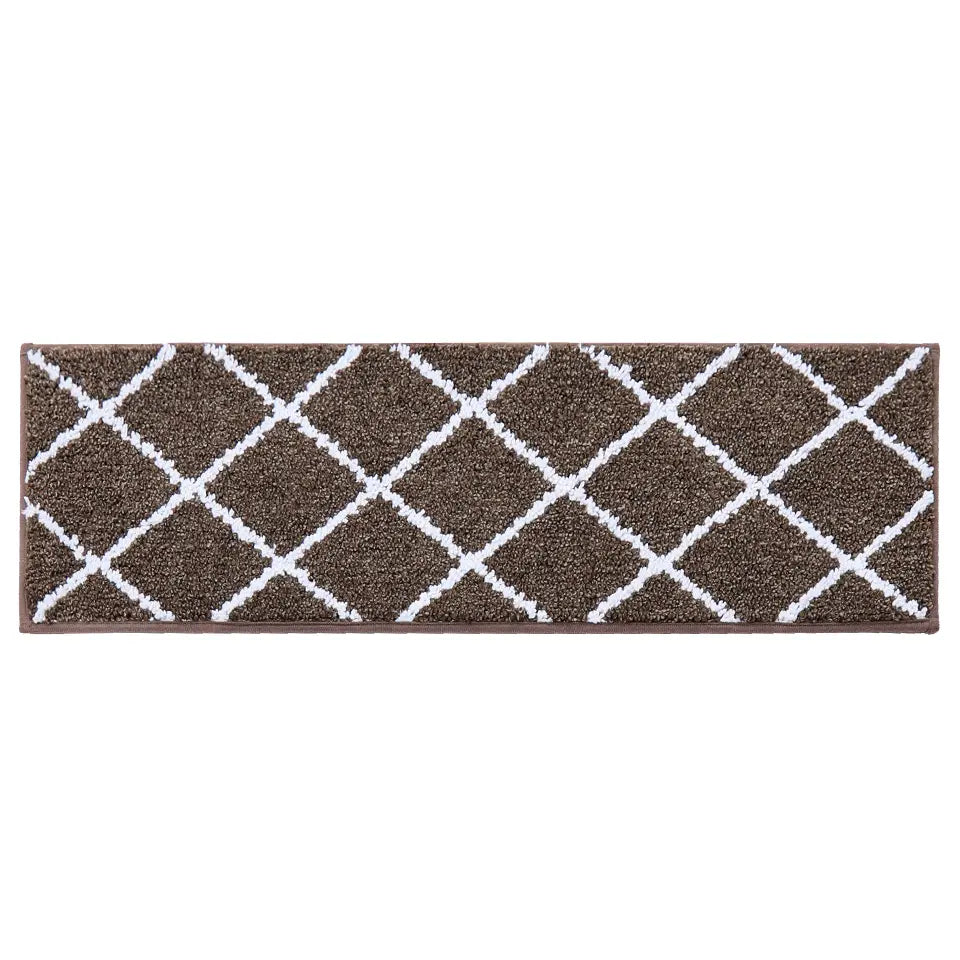Brown stair mat with white geometric pattern on a white background