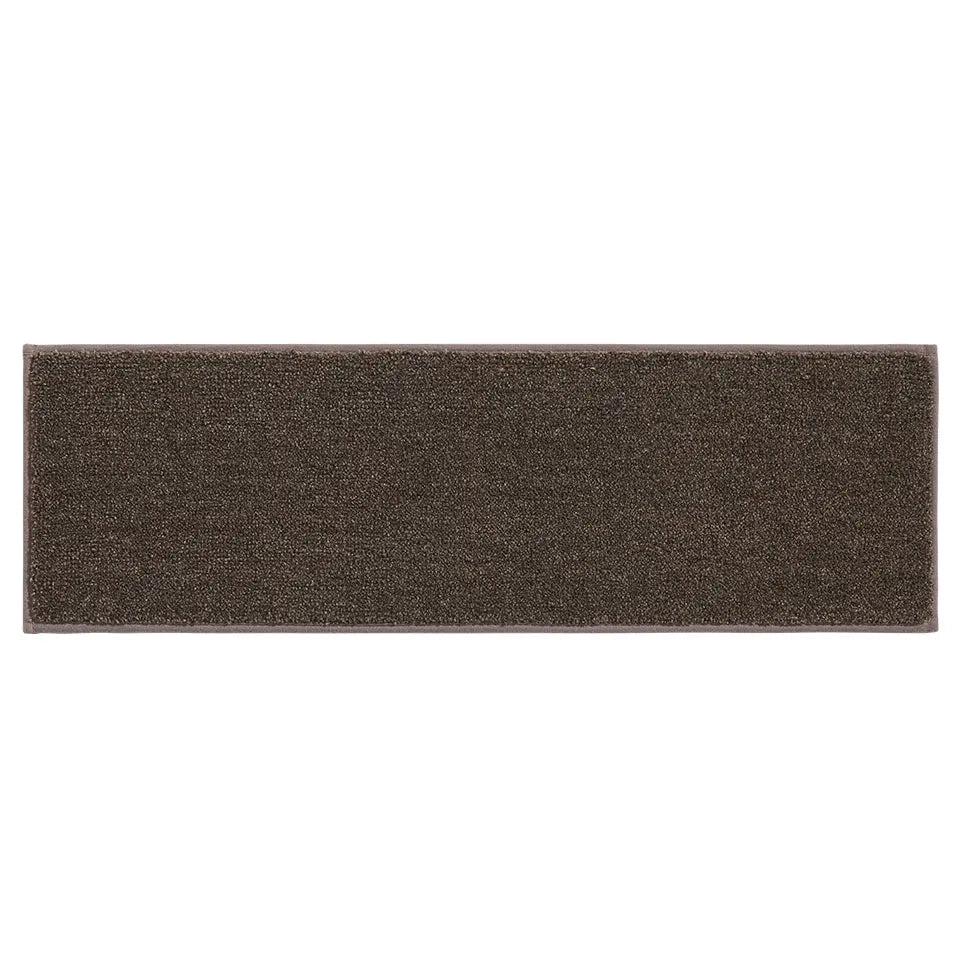 Rectangular brown rug treads for steps