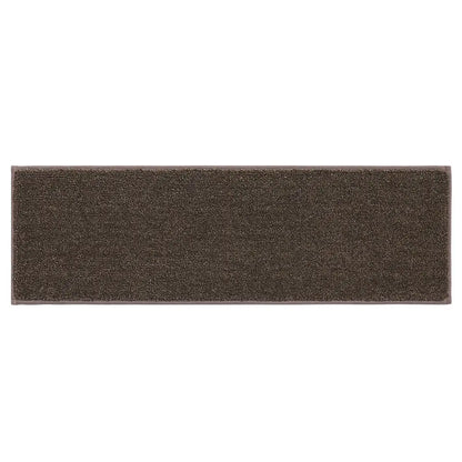 Rectangular brown rug treads for steps