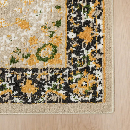 Close-up of a patterned rug with yellow and black design on a wooden floor.