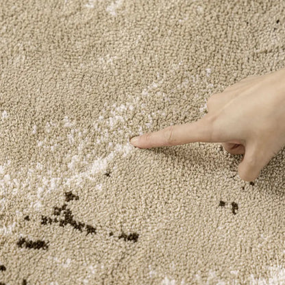 Textured area rug with a pattern on a wooden floor