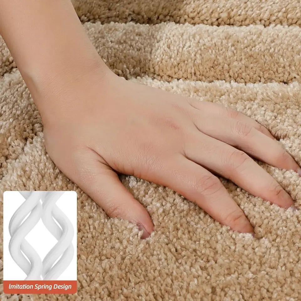 Hand on a textured carpet with an inset showing a 'Spring Design' symbol.
