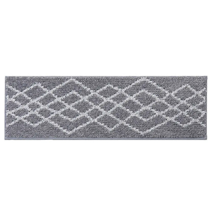 Grey stair treads with white geometric pattern on a white background