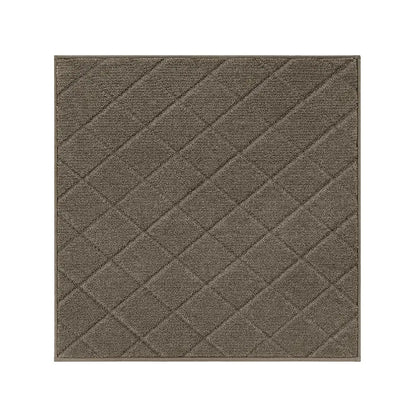 Textured light brown diamond patterned stair corner mat on a white background