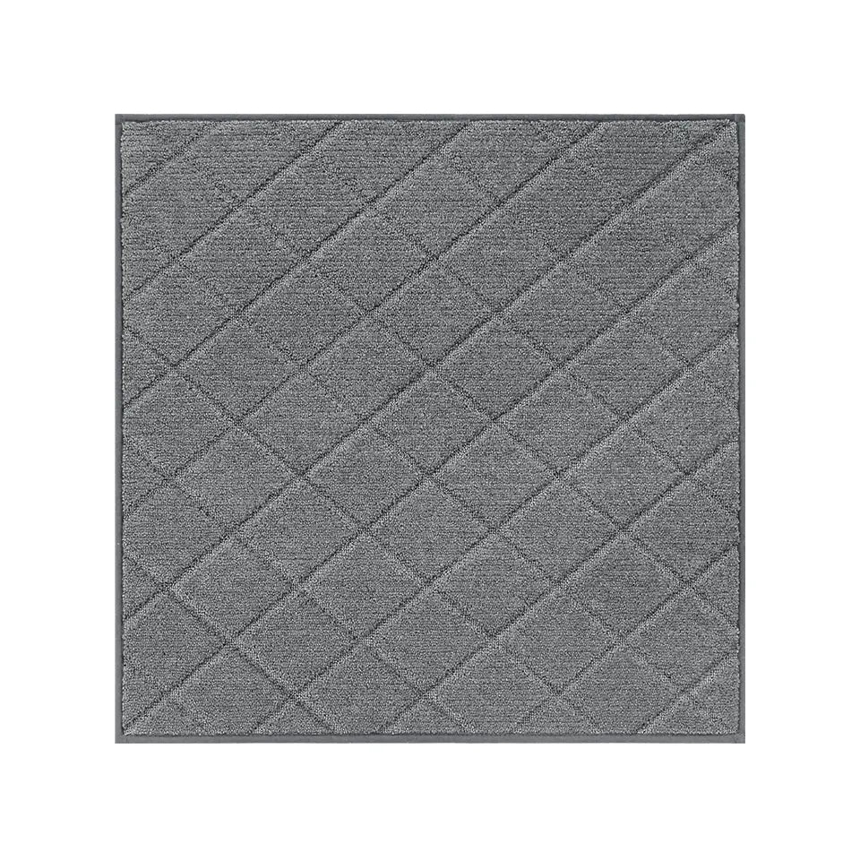 Medium grey diamond patterned landing mat on a white background
