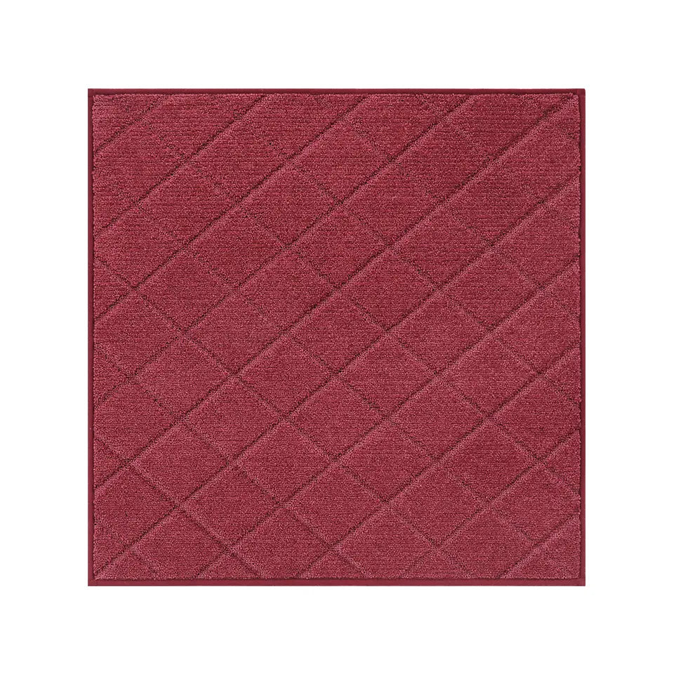 Red textured square mat on a white background