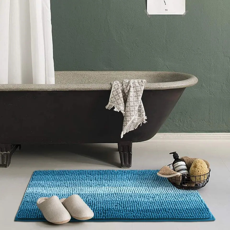 Teal Gradient Stripe Bath Rug in front of Tub