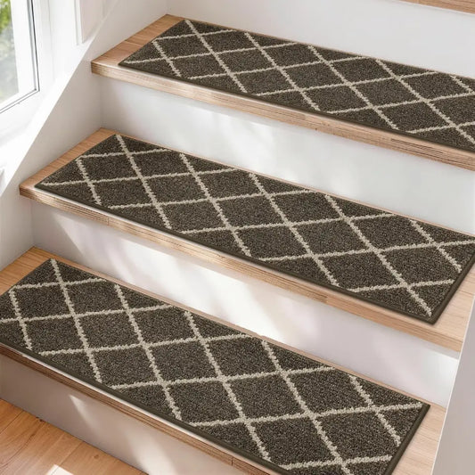 Brown stair treads with diamond pattern on wooden steps near a window.