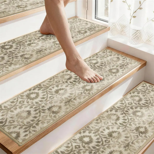 Vine Patterned stair runners on a staircase with a person stepping onto one.