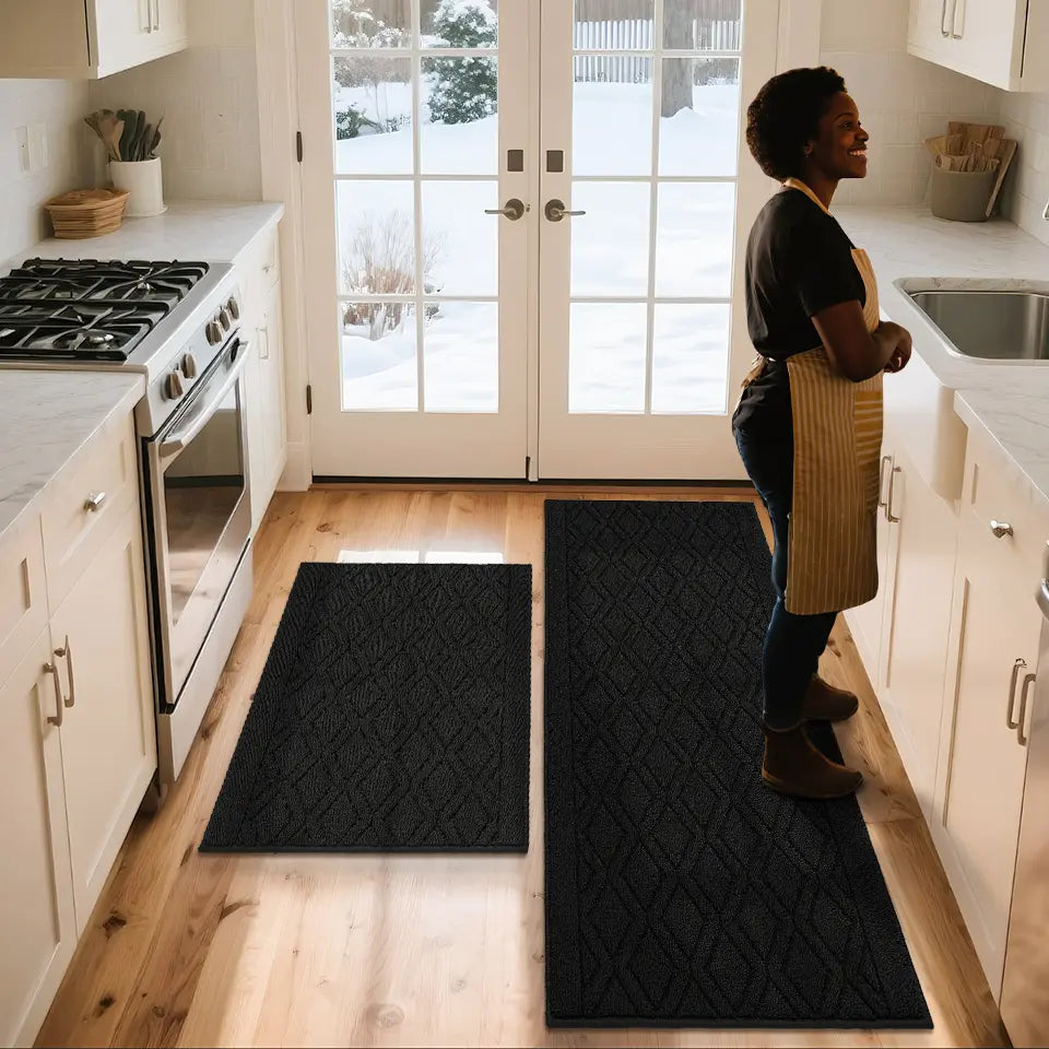 Woman Stand in Kitchen with Black Kitchen Rugs Set